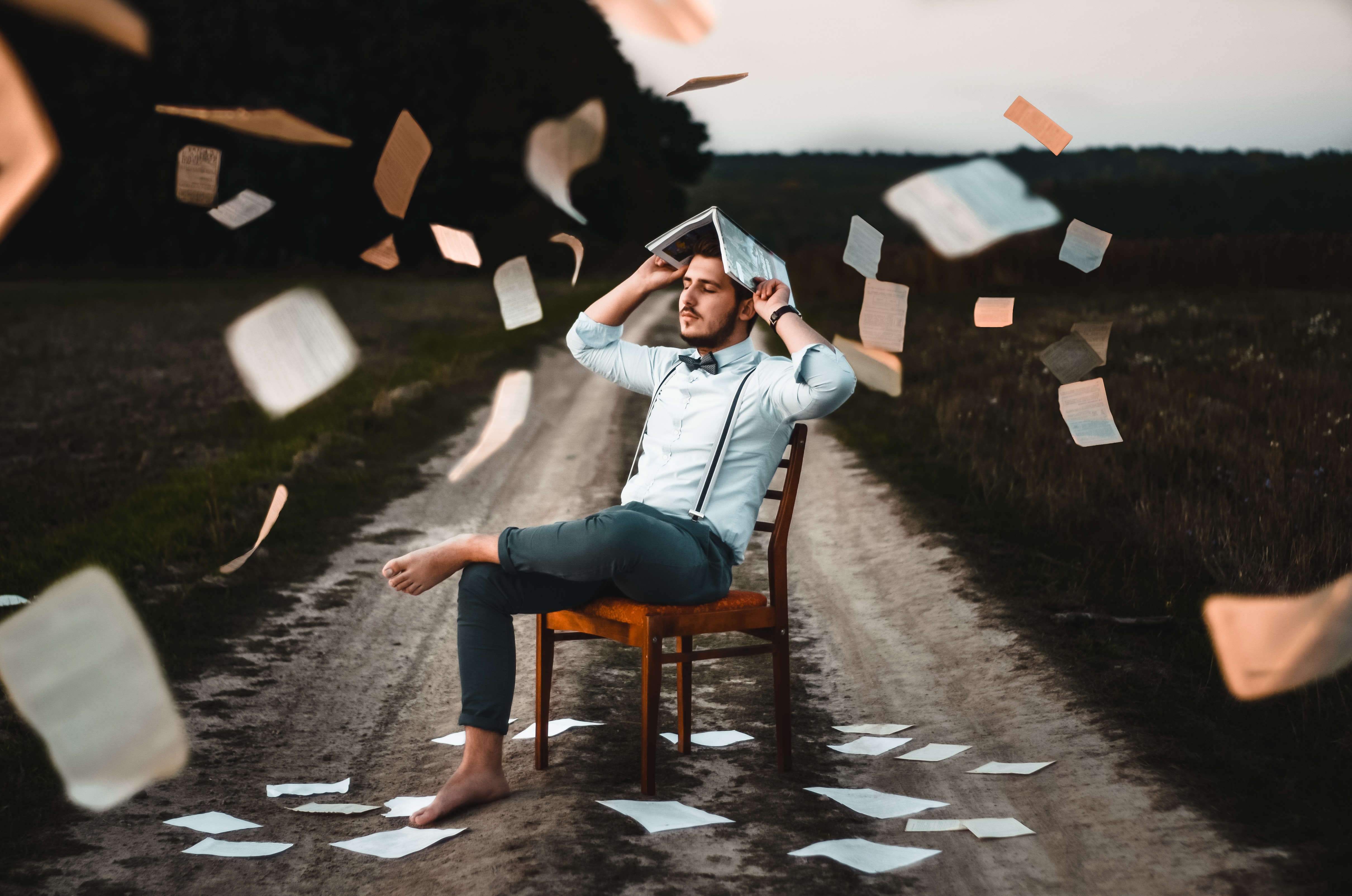Guy with papers flying