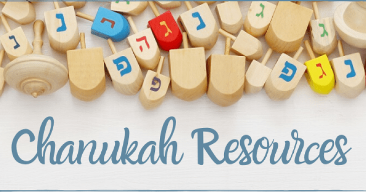 Chanukah resources written below dreidels