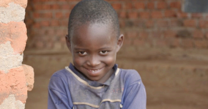 Little boy in African village