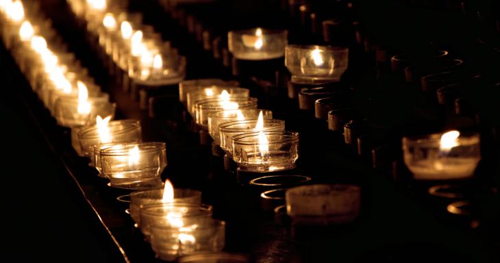 Rows of memorial candles