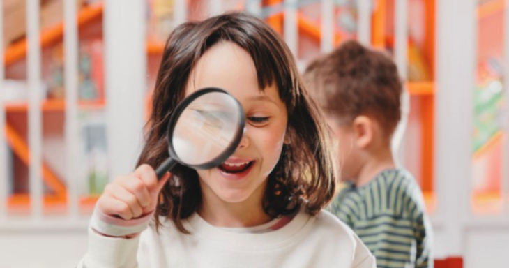 Girl with Magnifying Glass