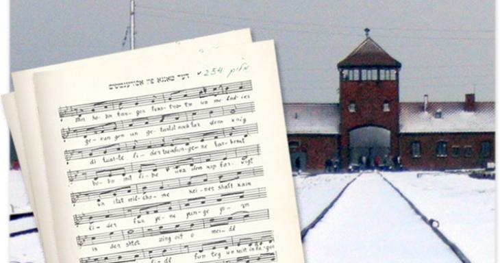 Sheet music in front of the Auschwitz train station
