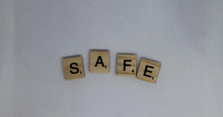 Scrabble tiles with the word "safe"