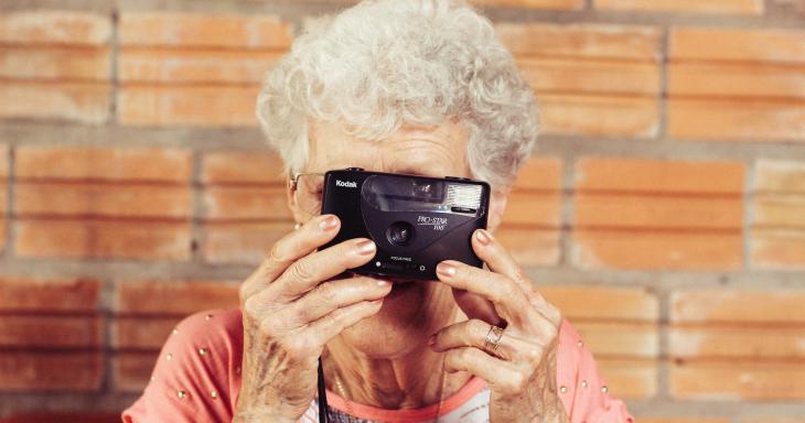 woman holding a camera