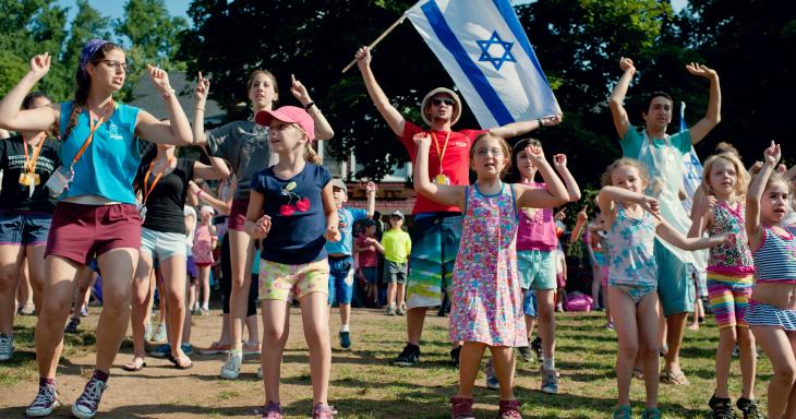Teens leading young children in dance at Camp Ramah Nyack