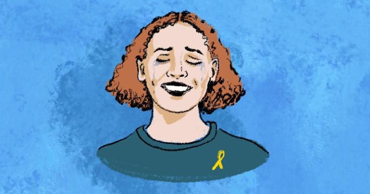 woman crying with yellow ribbon