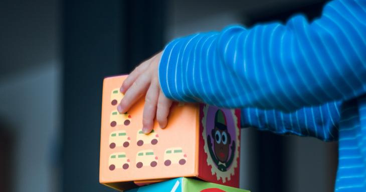 Child with building blocks