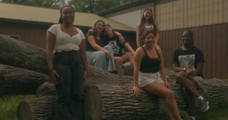 Jewish teens pose together at camp