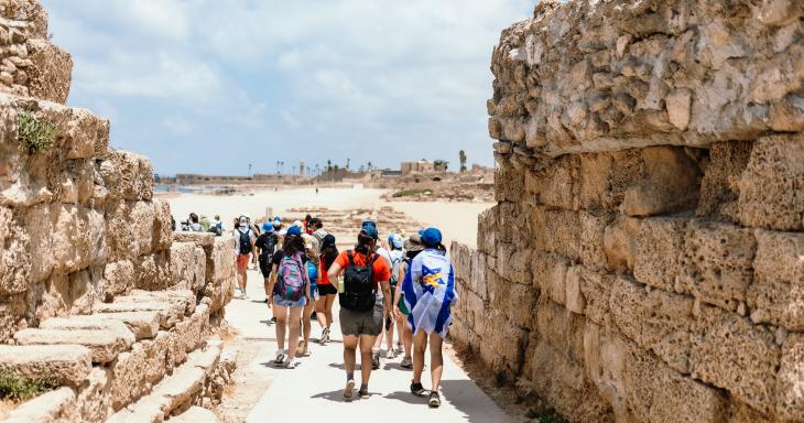 group of students walking through historic site in Israel