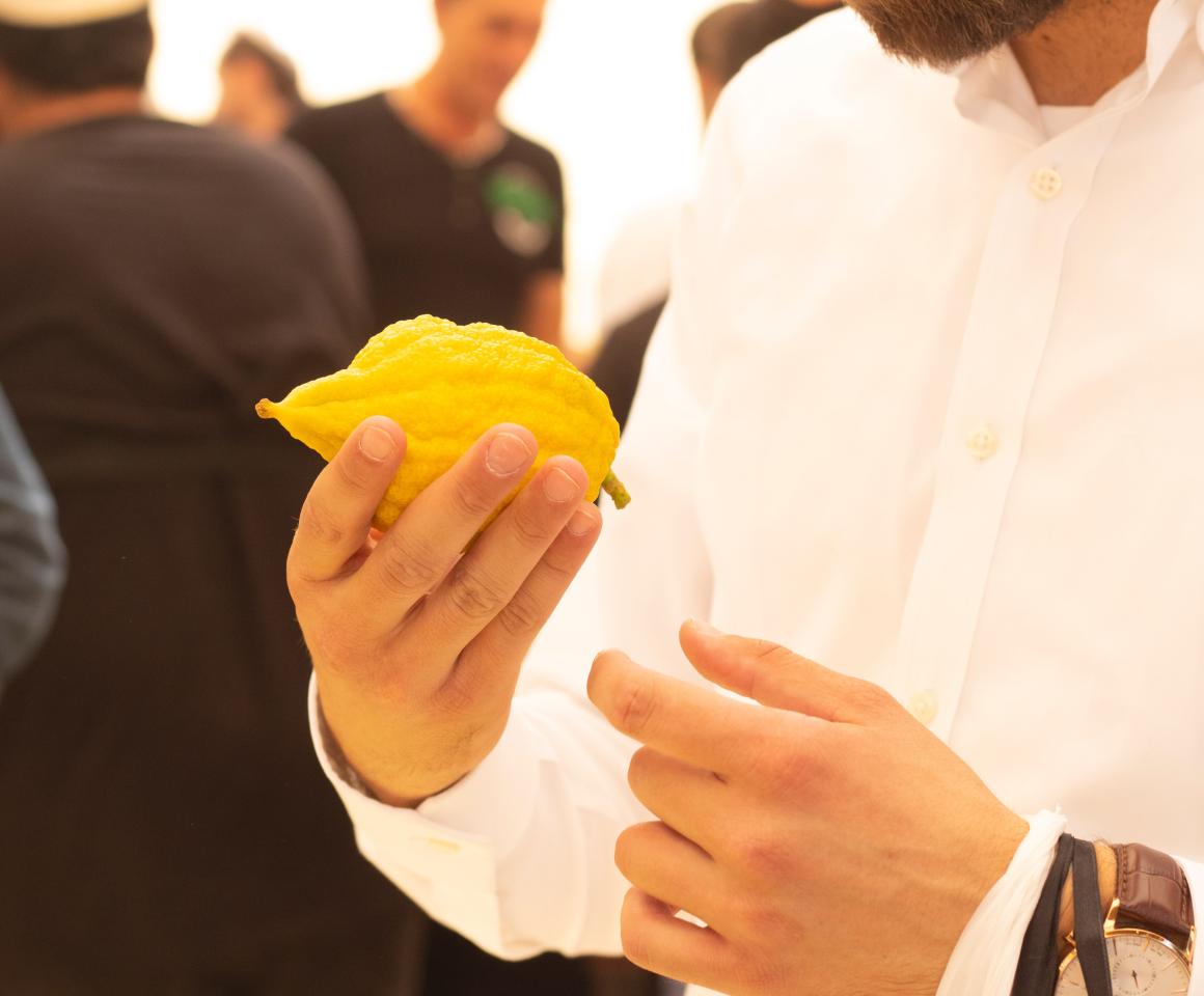 Man holding etrog