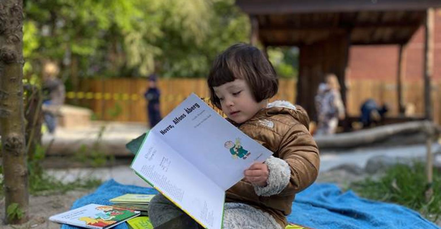 Child with book