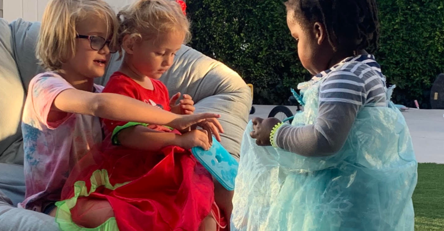 Children in costumes playing