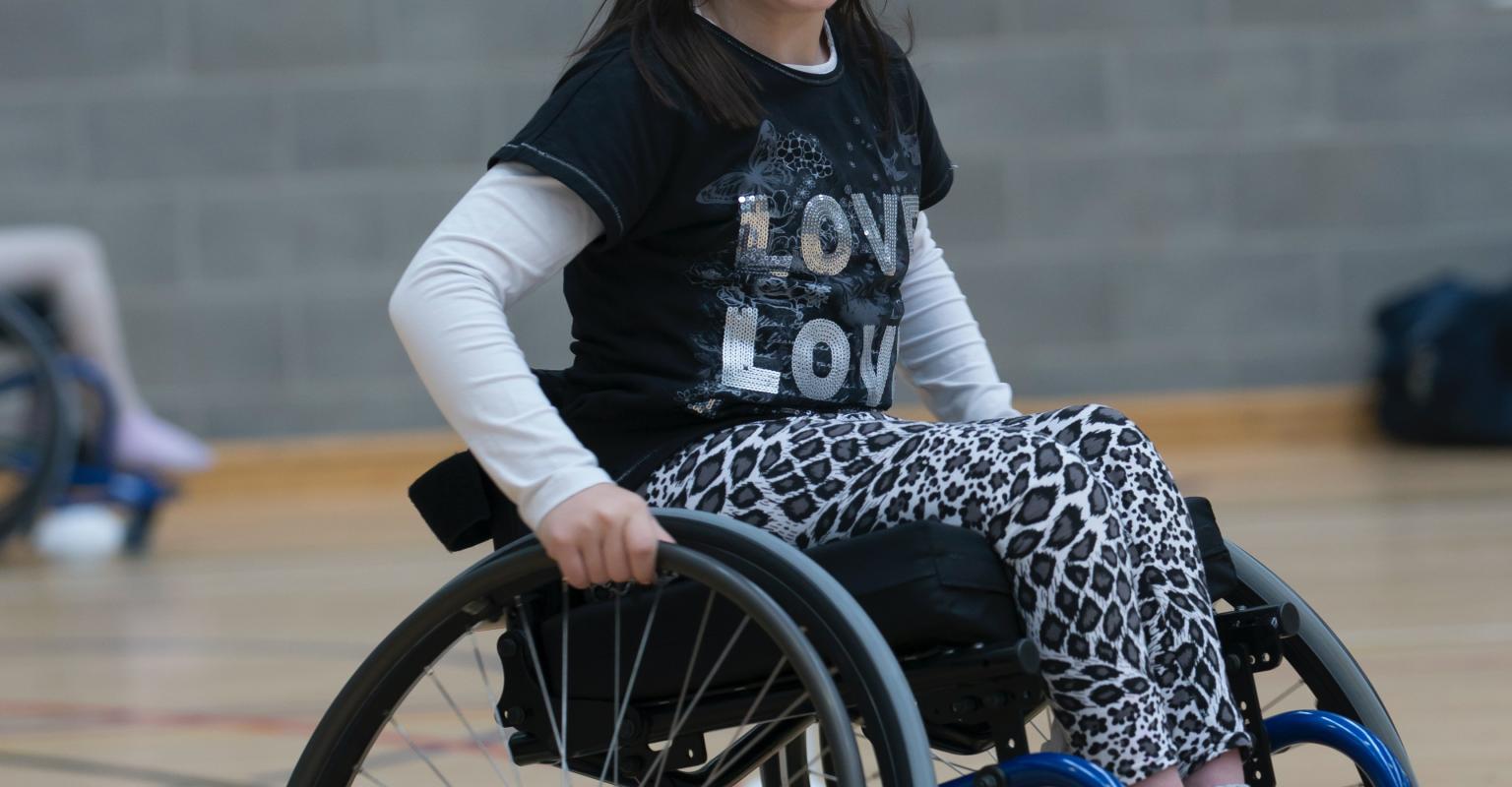 Smiling child in wheelchair