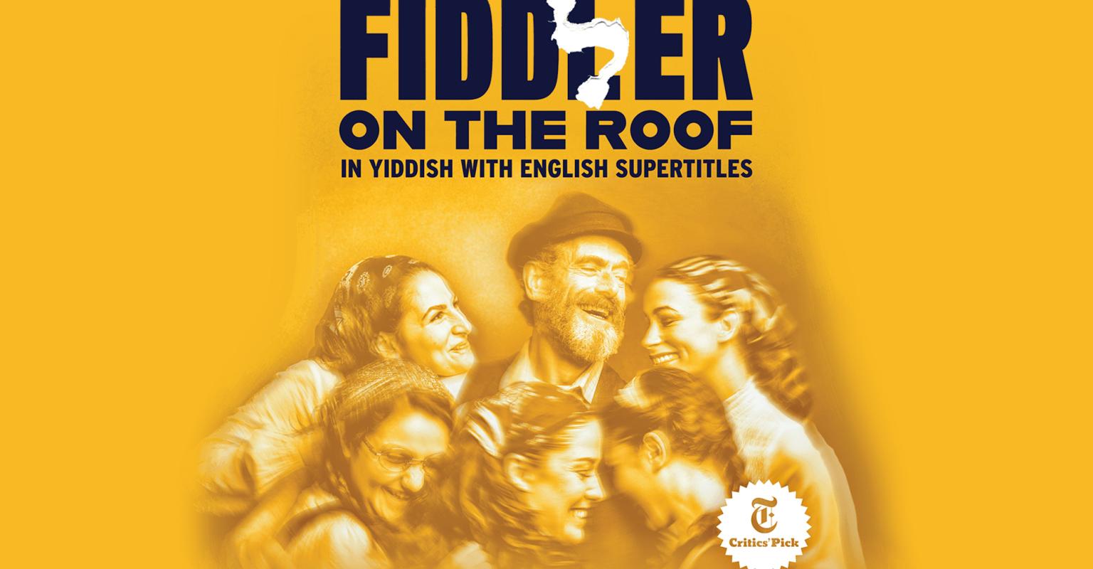 The text Fiddler on the Roof in Yiddish with characters, family huddled around smiling
