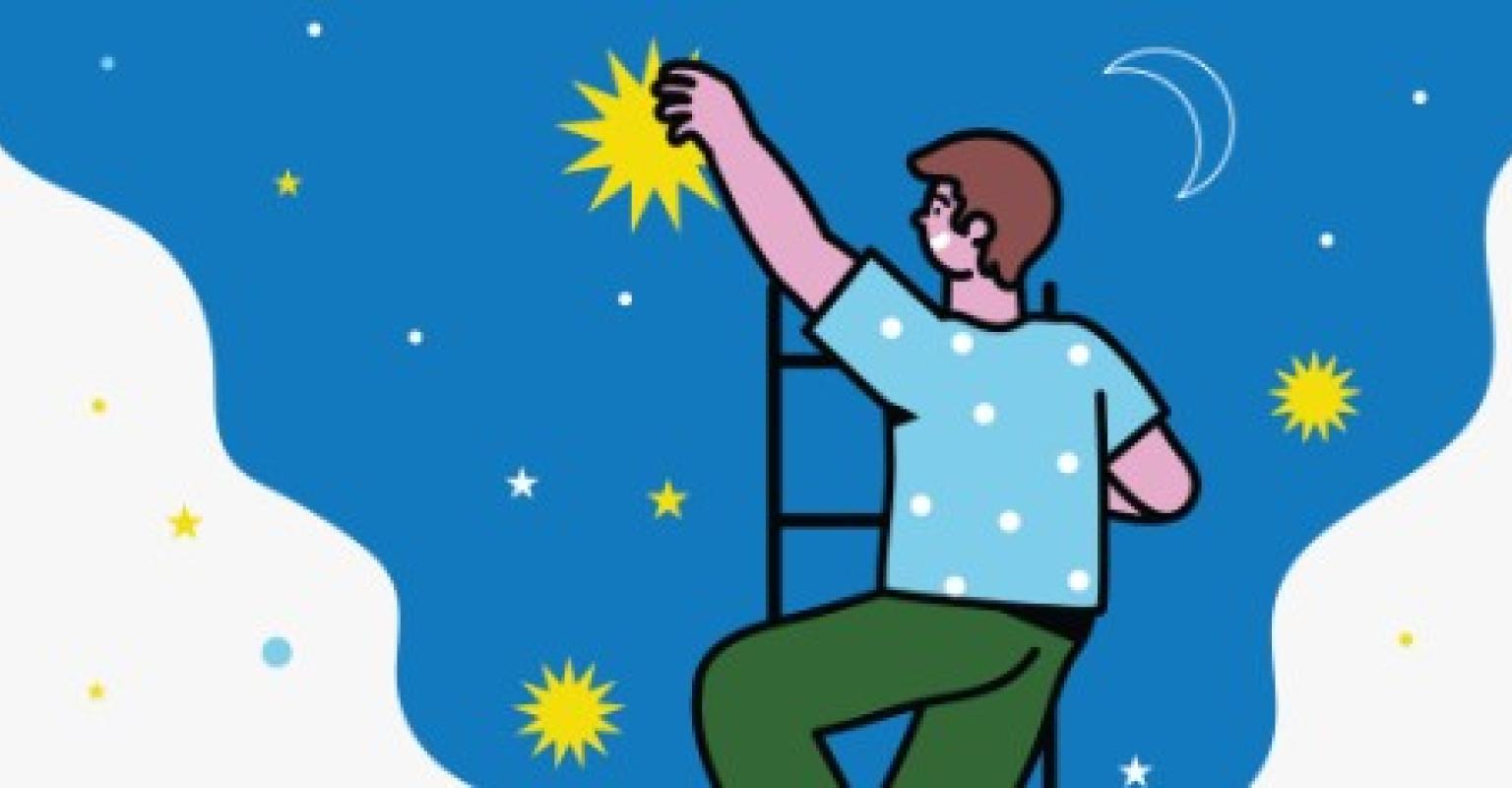 Person on a ladder hanging stars