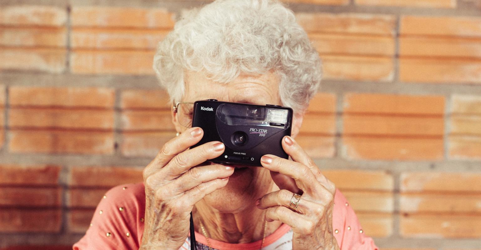 woman holding a camera