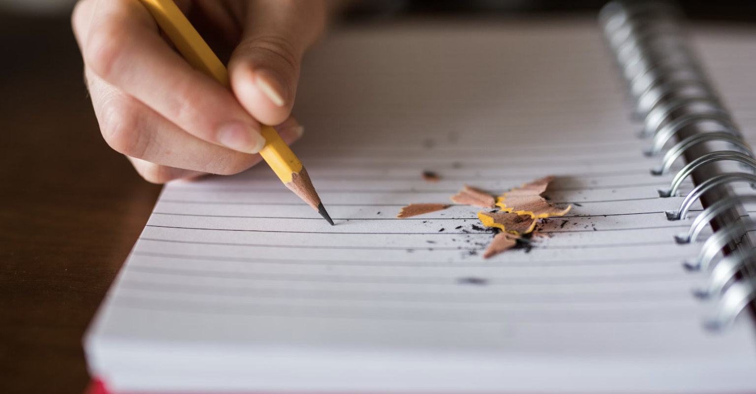 writing in notebook