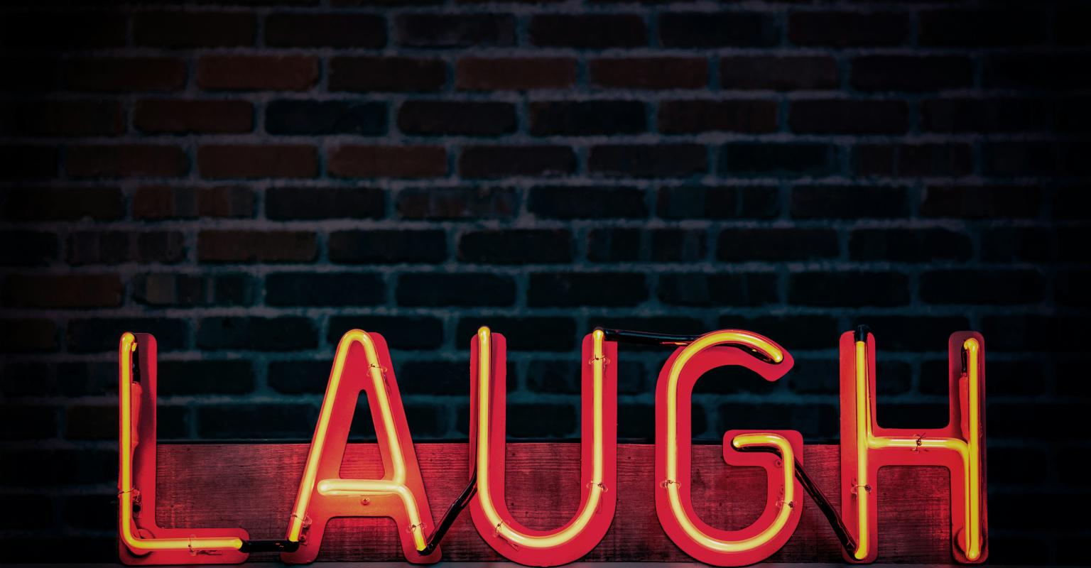 Neon Laugh sign