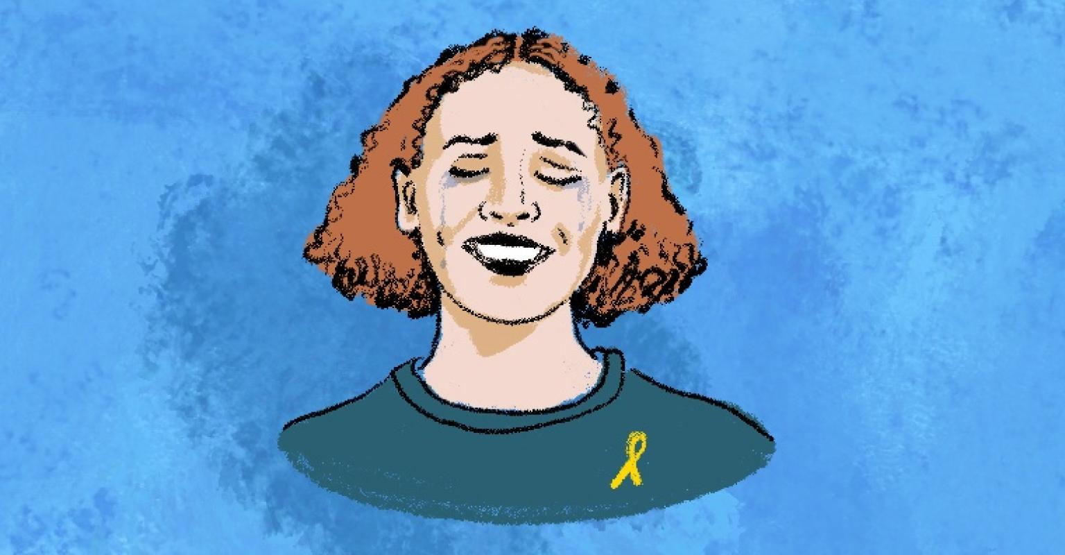 woman crying with yellow ribbon