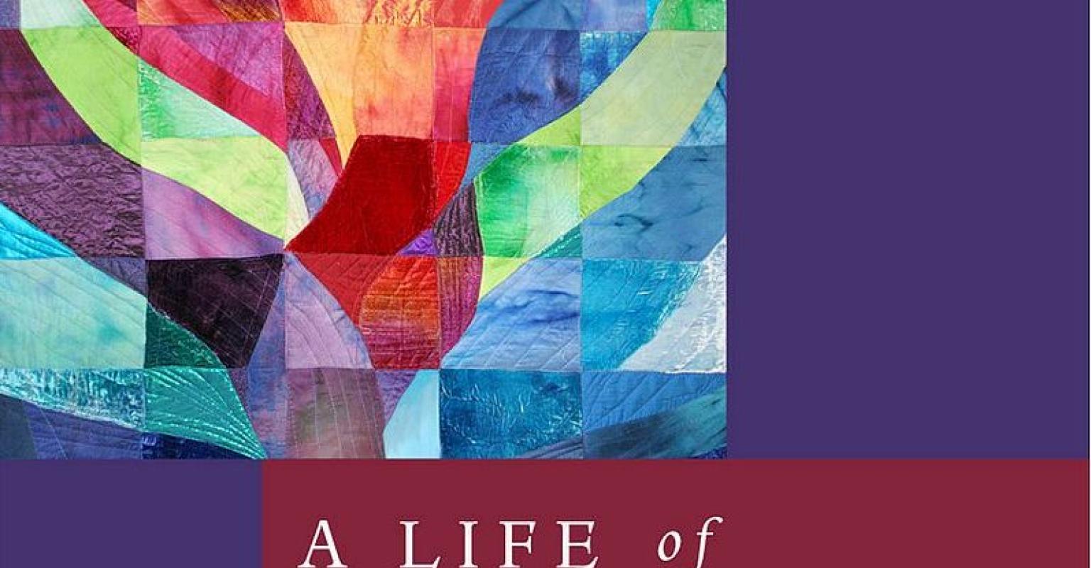 The cover of "A Life of Meaning" features Ark Curtain by Jeanette Kuvin Oren for Fire Island Synagogue, NY.