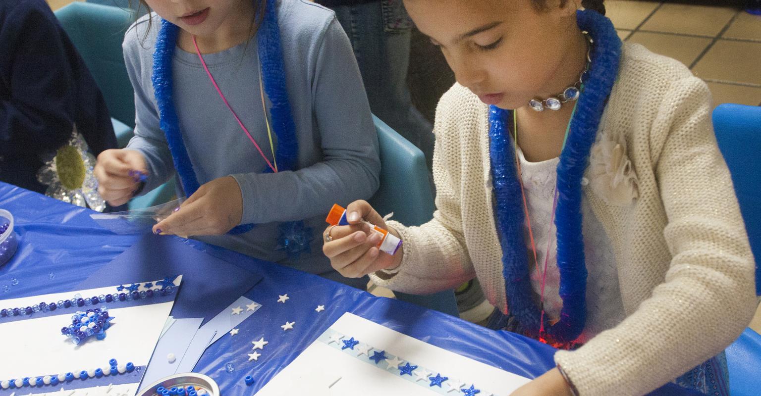 Young students doing an Israel-related art activity.