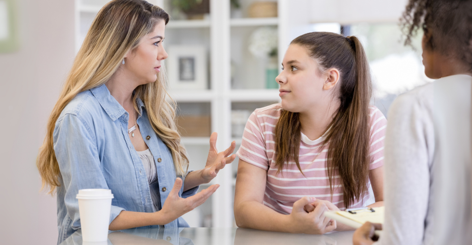 teen and adult talking