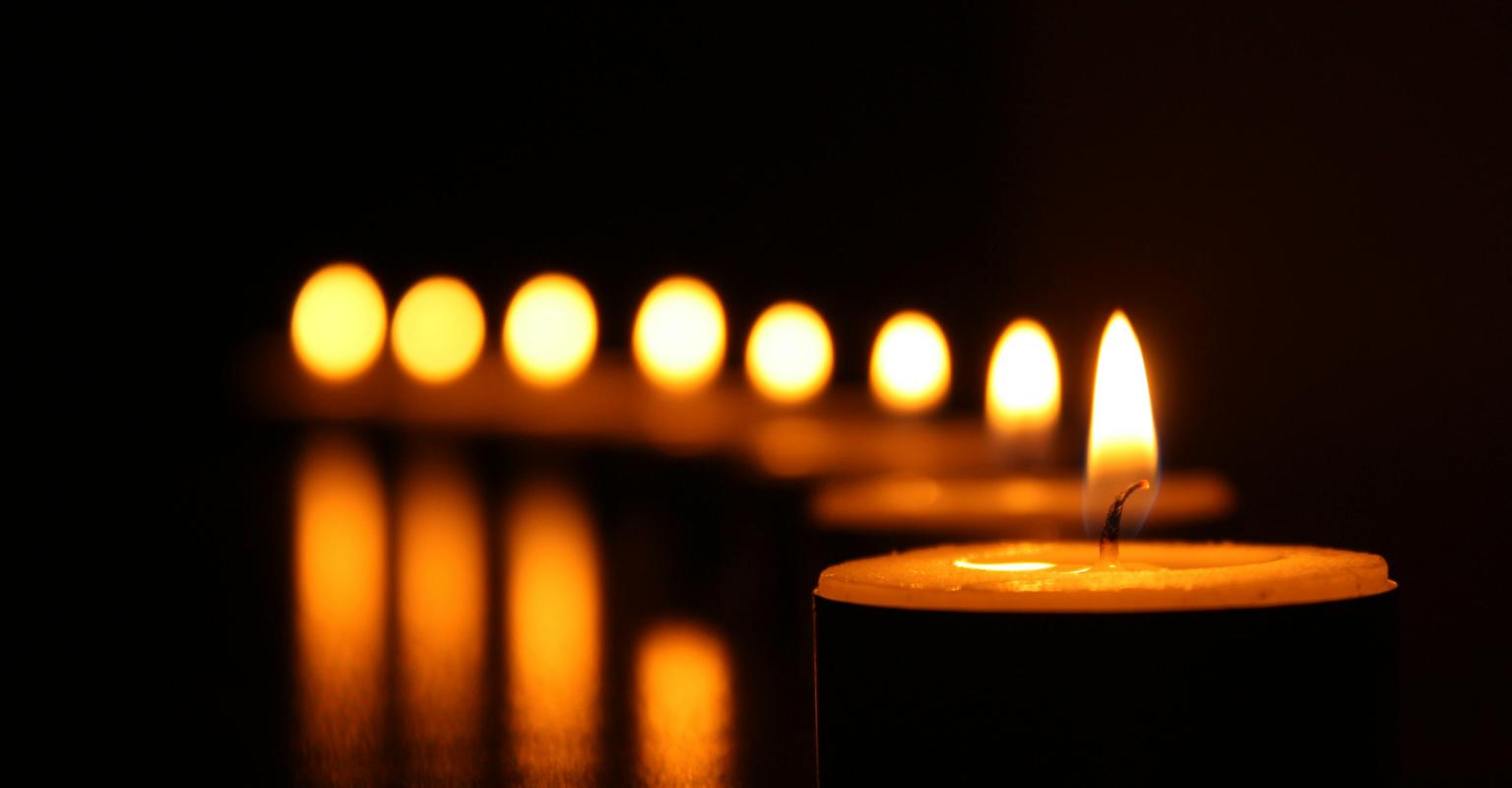 A row of memorial candles. 