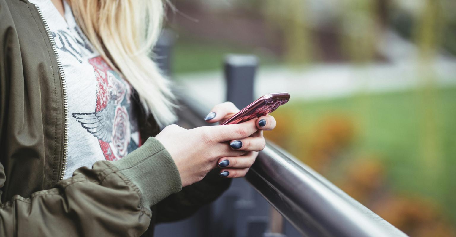 Woman texting on phone