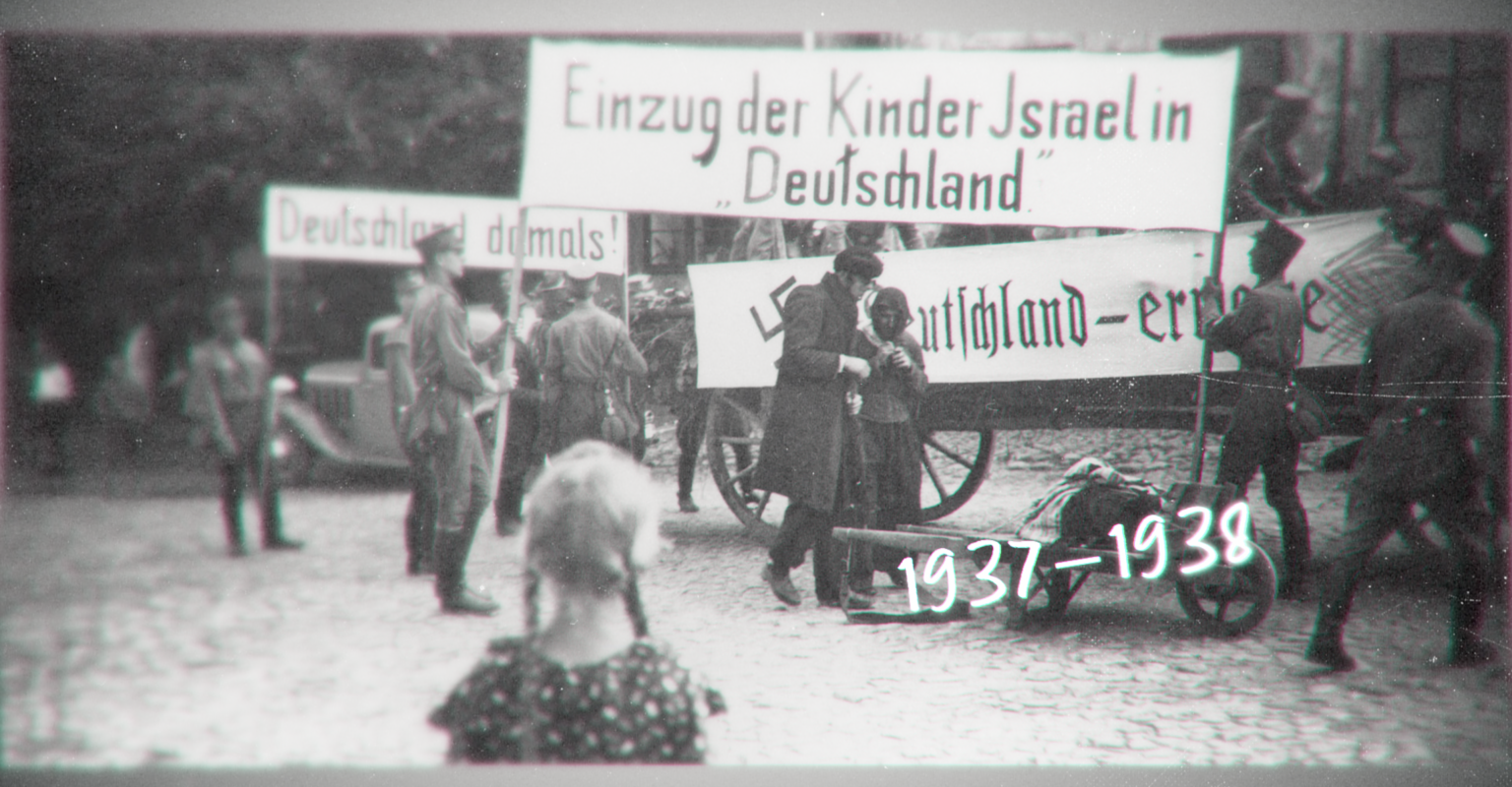 A young girl watching Nazis hold up antisemitic signs in German. The dates 1937-1938 are listed below.