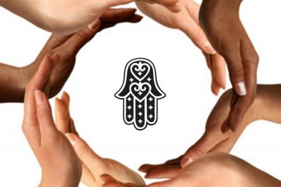 Diverse hands surrounding a Hamsa