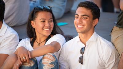 Two teens speaking with each other