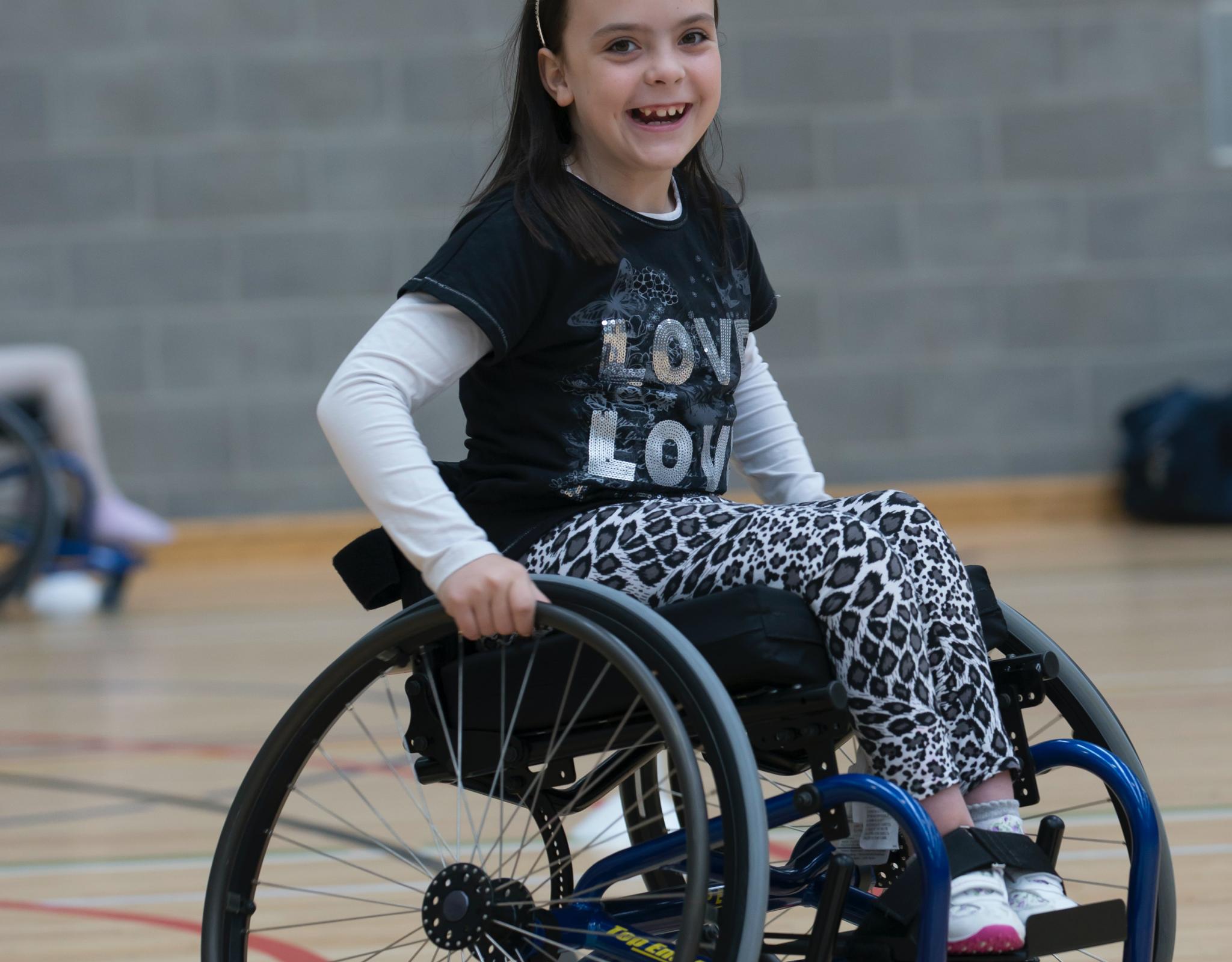 Smiling child in wheelchair