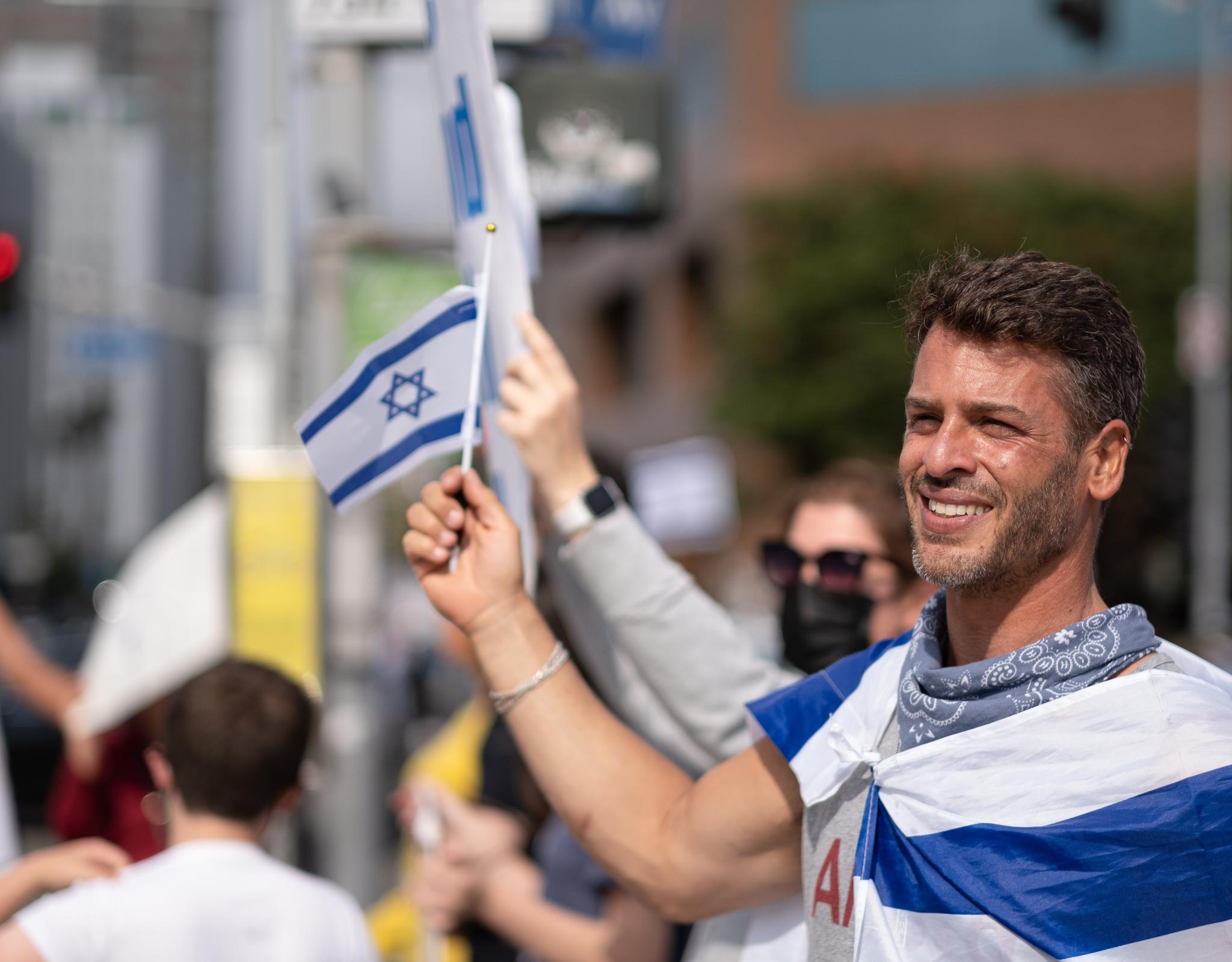 Man with flag of Israel
