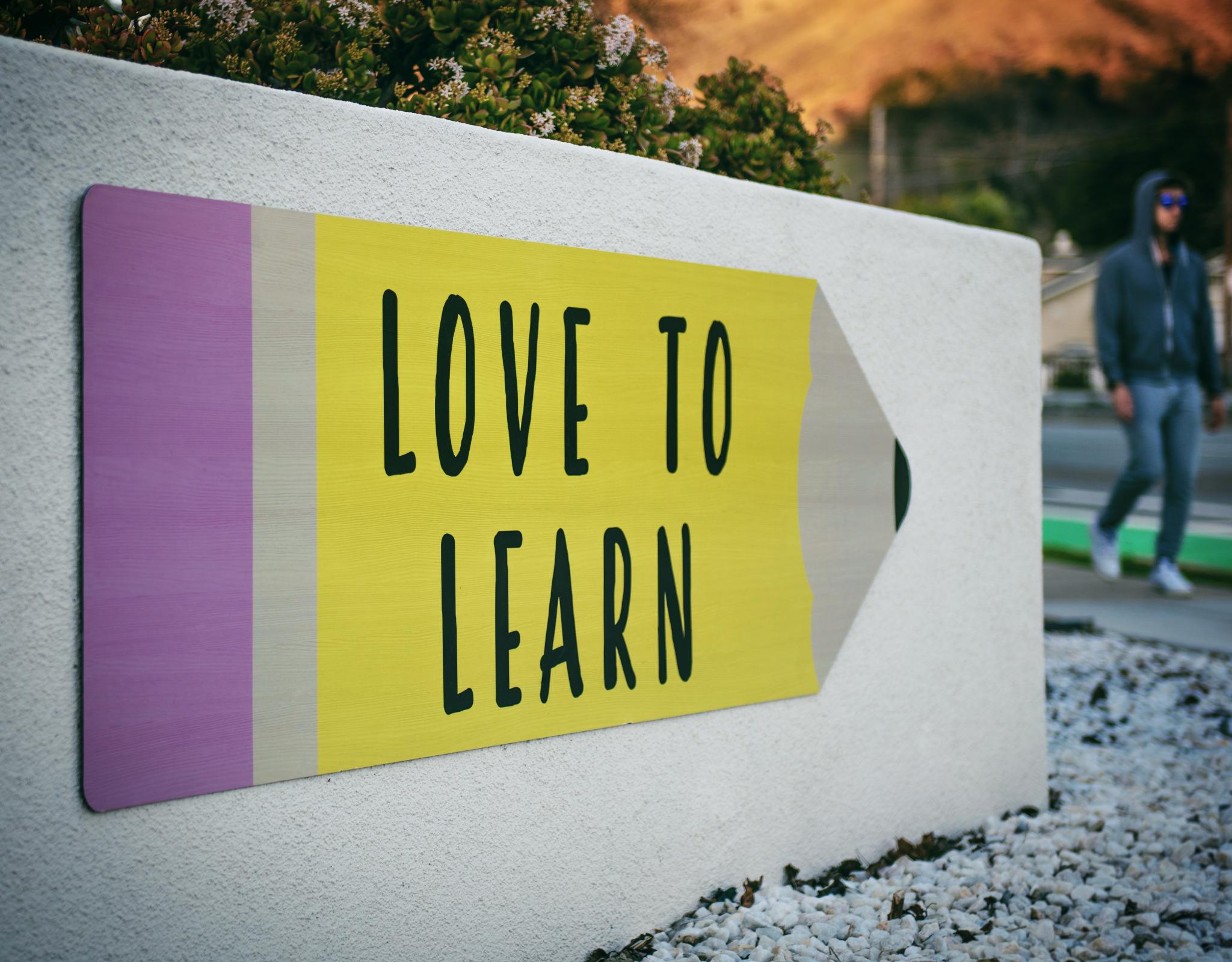 poster that says love to learn