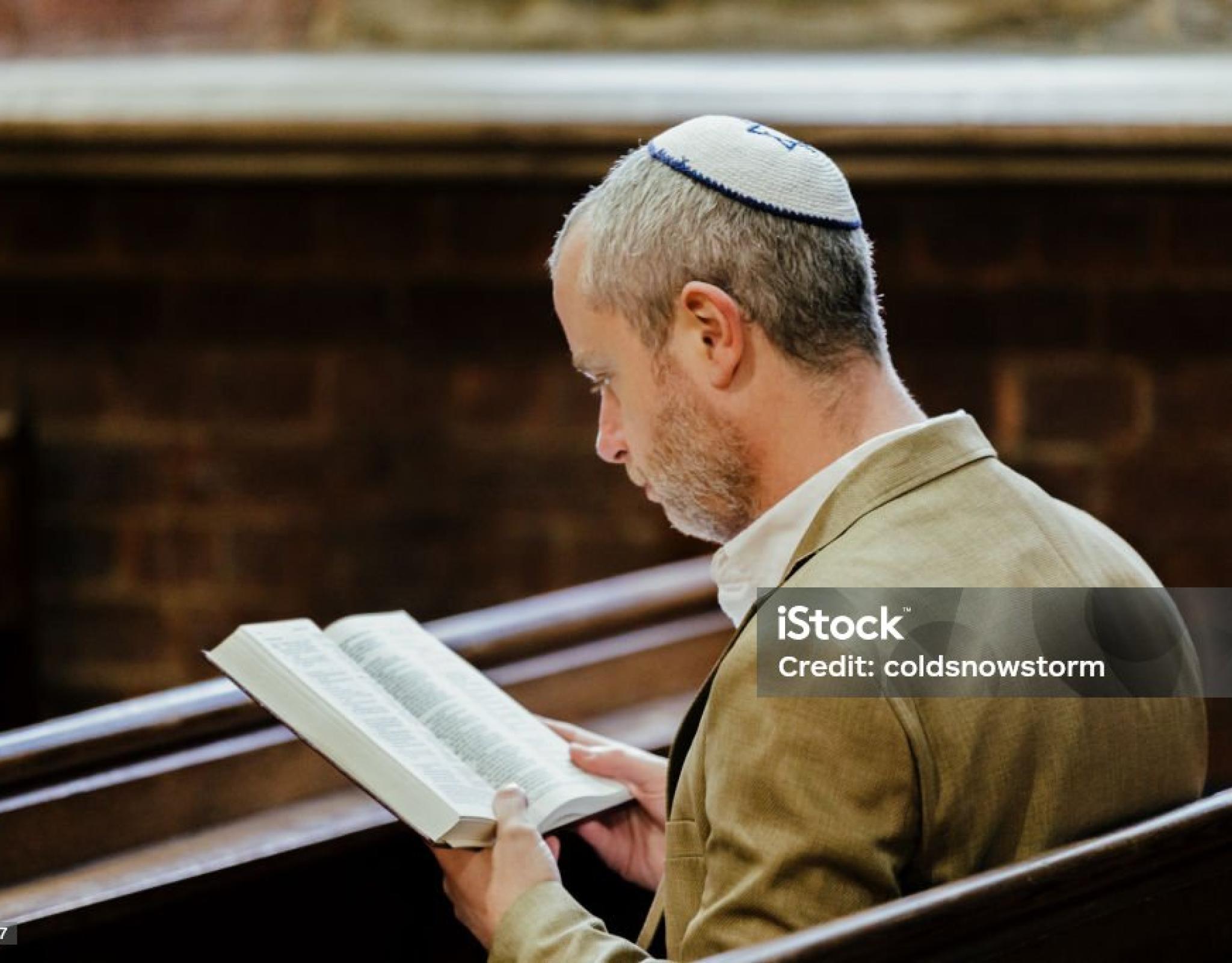 Man in Kippah prays on Yom Kippur