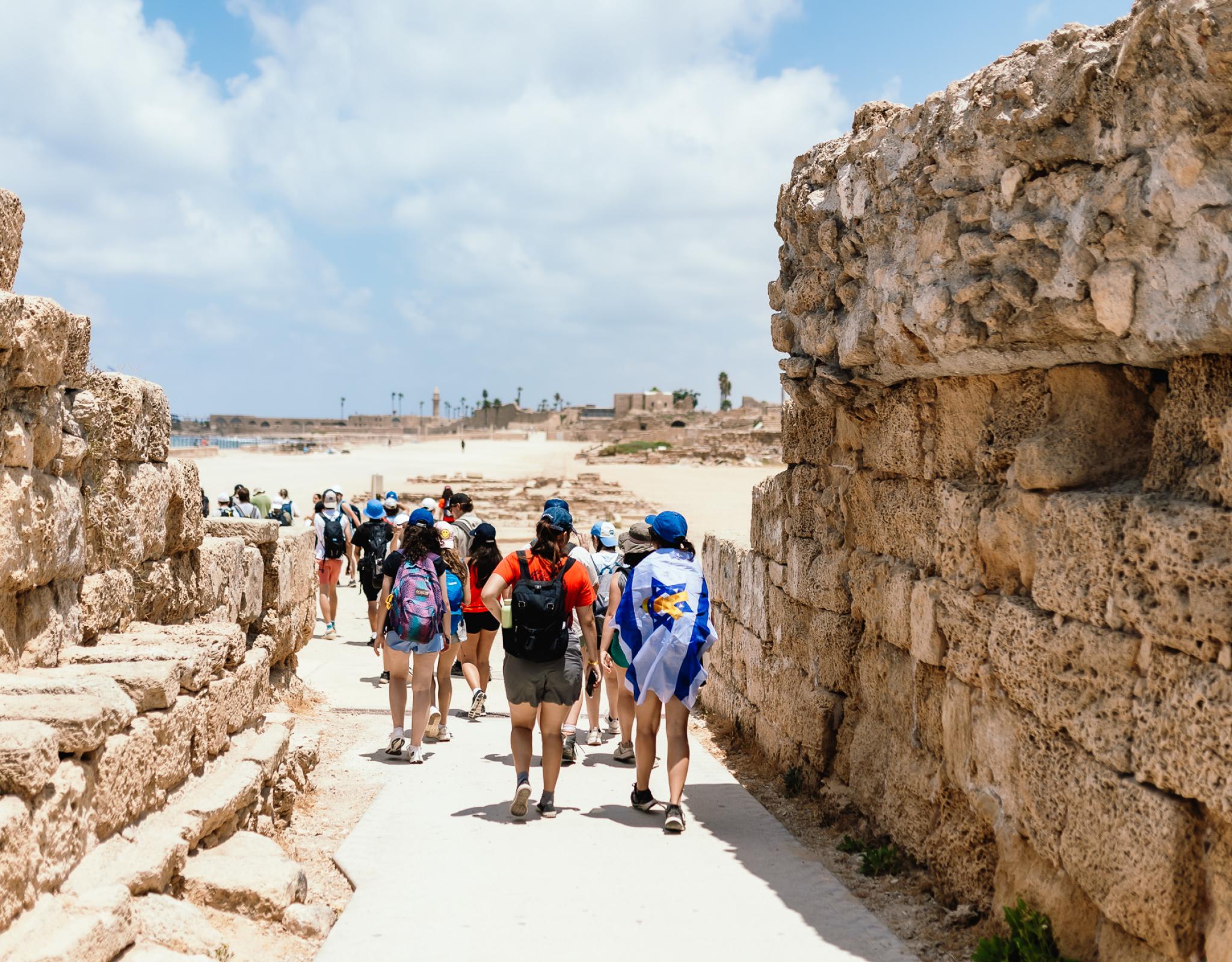 group of students walking through historic site in Israel