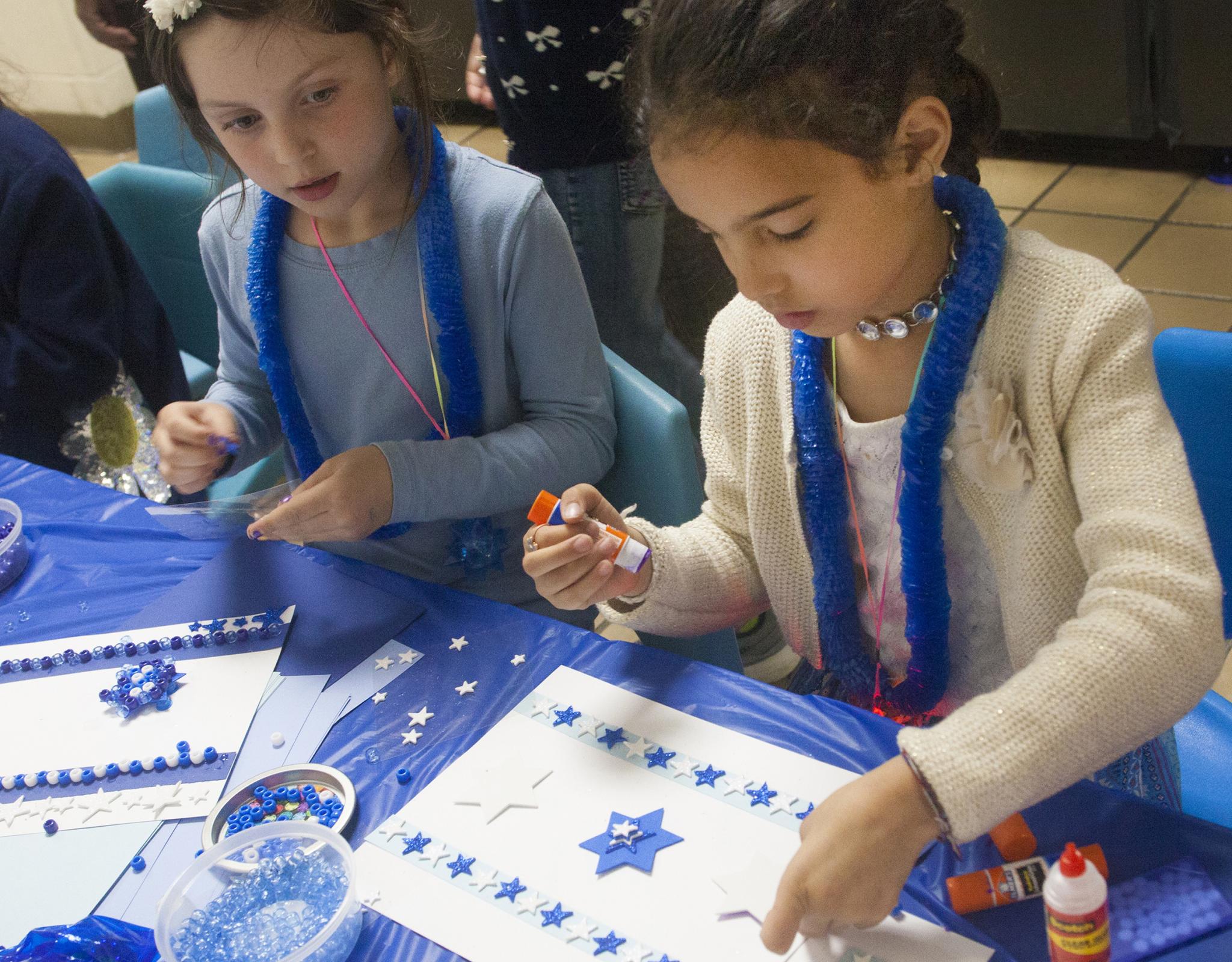 Young students doing an Israel-related art activity. 