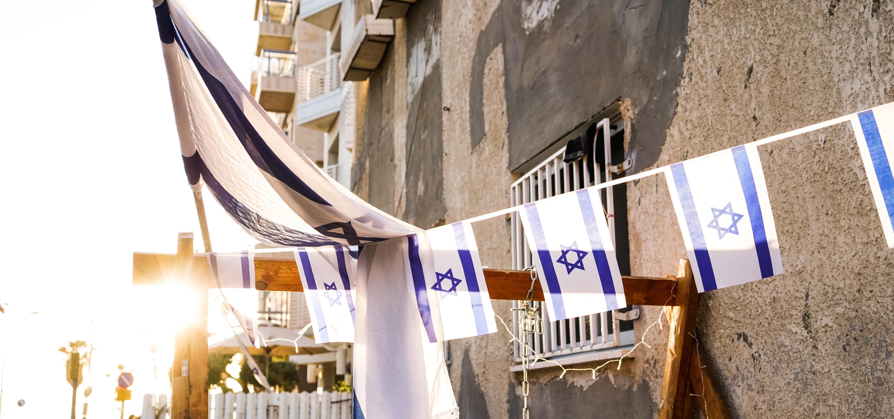 Israeli flags on building