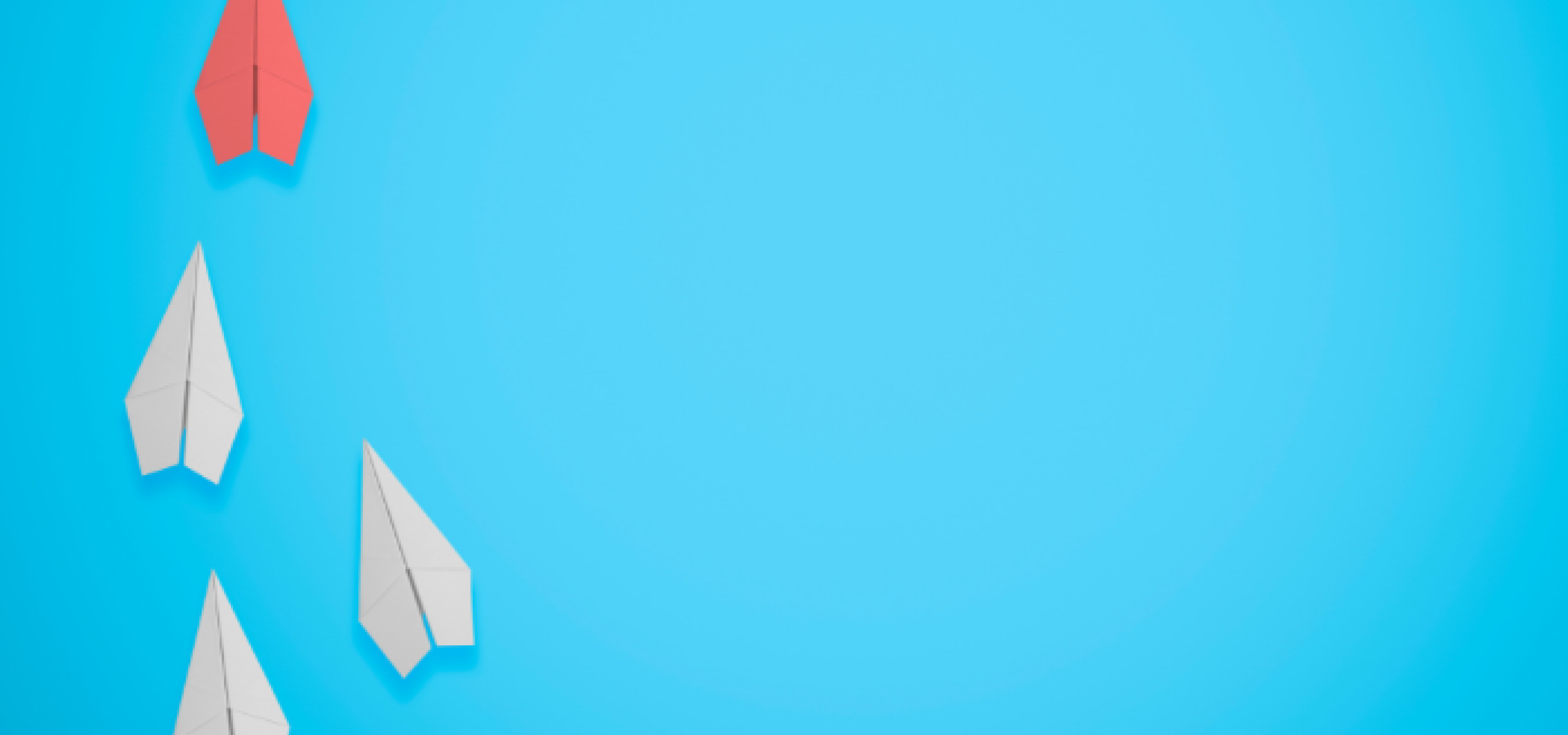 Blue background with paper airplanes