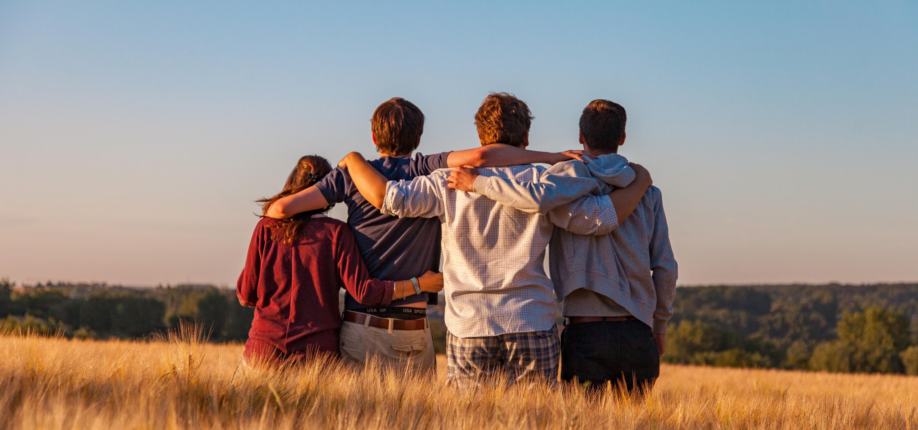 Arms around shoulder