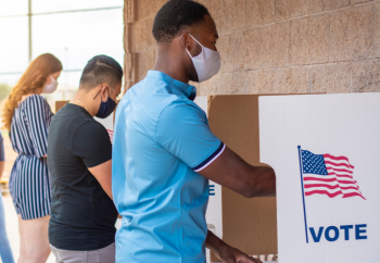 Young people voting at an election polling place