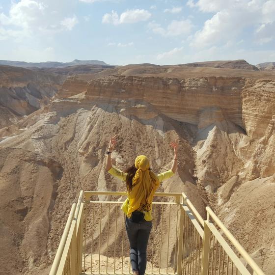 Teen looking at a desert view