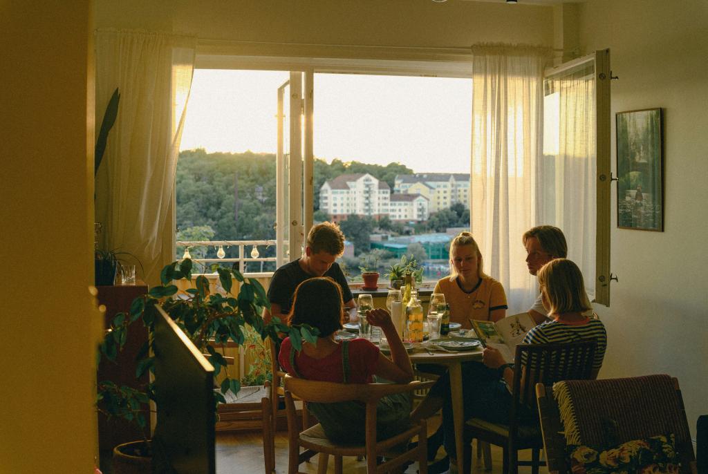Young adults eating dinner