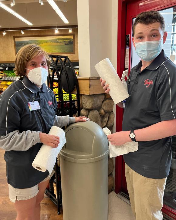 Teenagers working at a grocery store