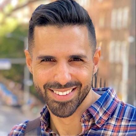 A headshot of Nadav. 