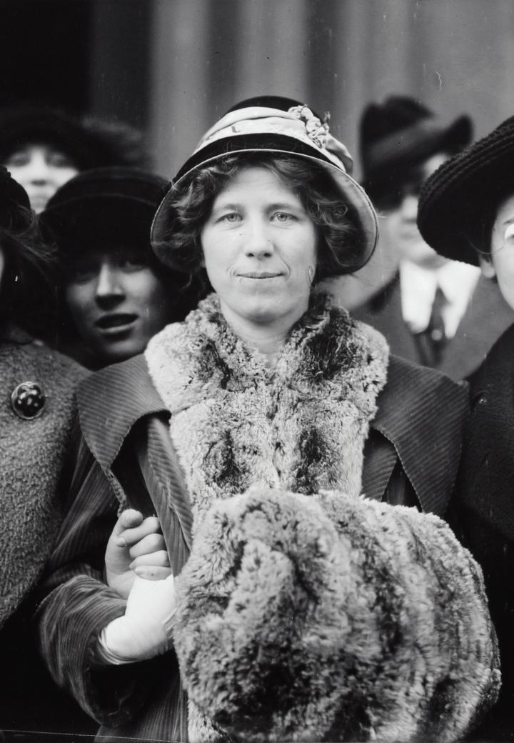 Suffragettes standing together during strike