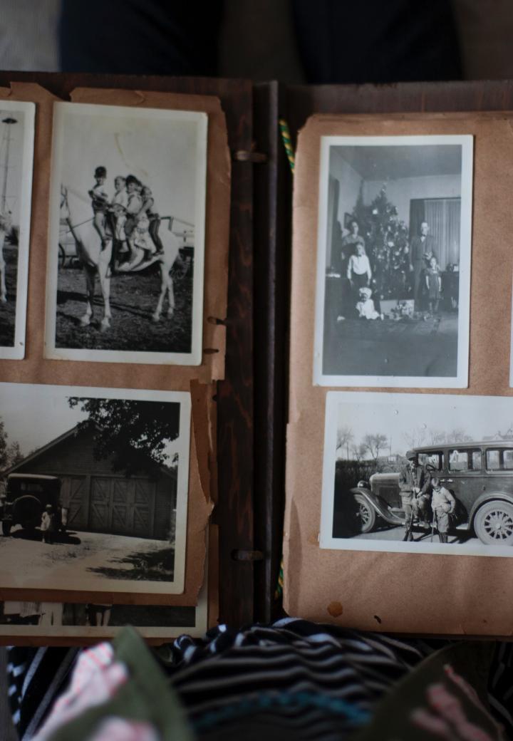 Person looking through old photo album
