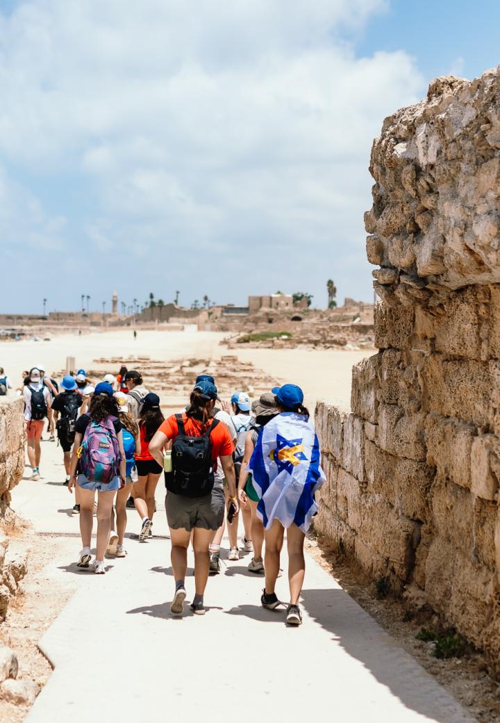 group of students walking through historic site in Israel