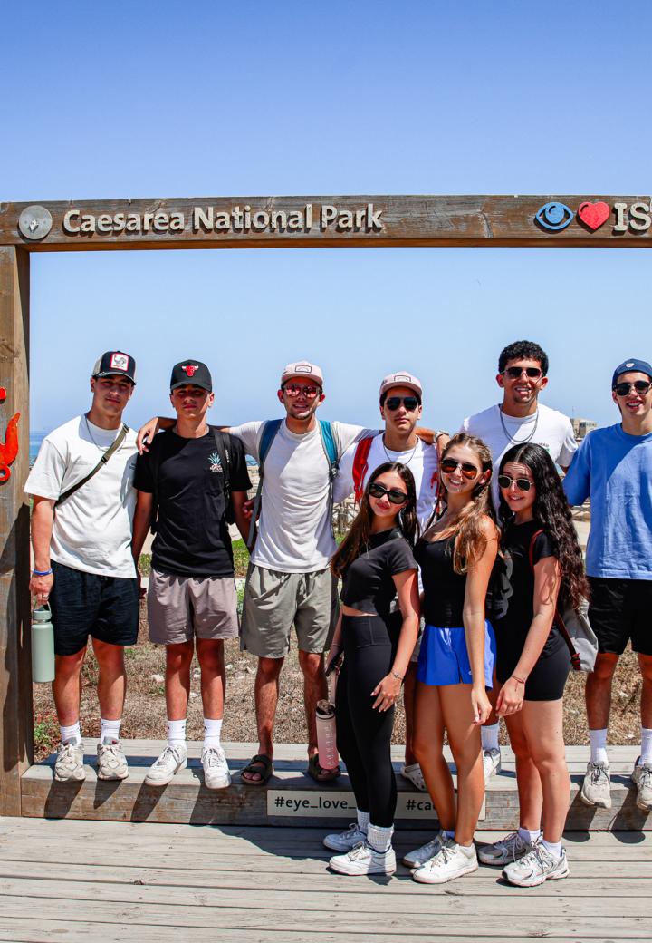 Teens posing in a frame